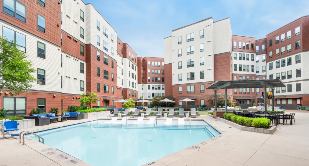 Crystal clear pool with modern apartment