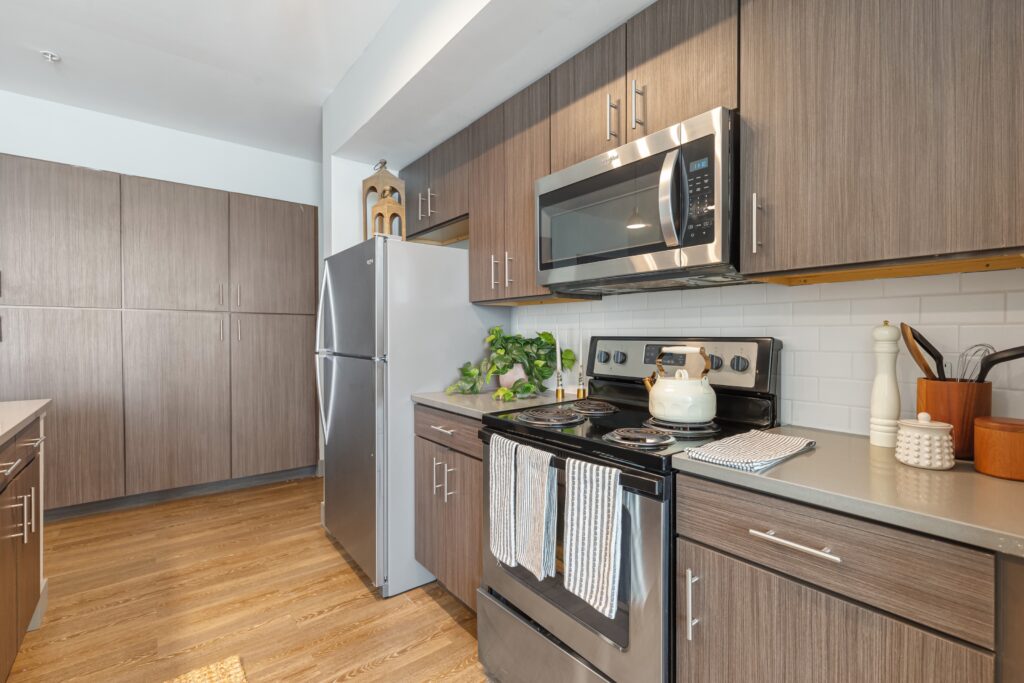 Modern kitchen with mid tone brown cabinets